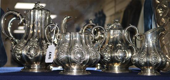 A Victorian embossed silver four piece tea and coffee set, by Roberts & Slater, Sheffield, 1851/3, gross 79 oz.